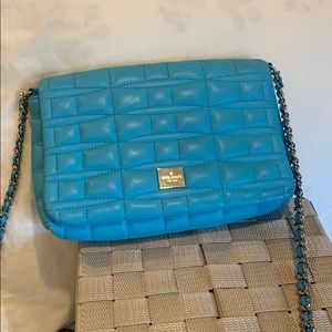 Blue quilted Kate Spade purse with chain strap
